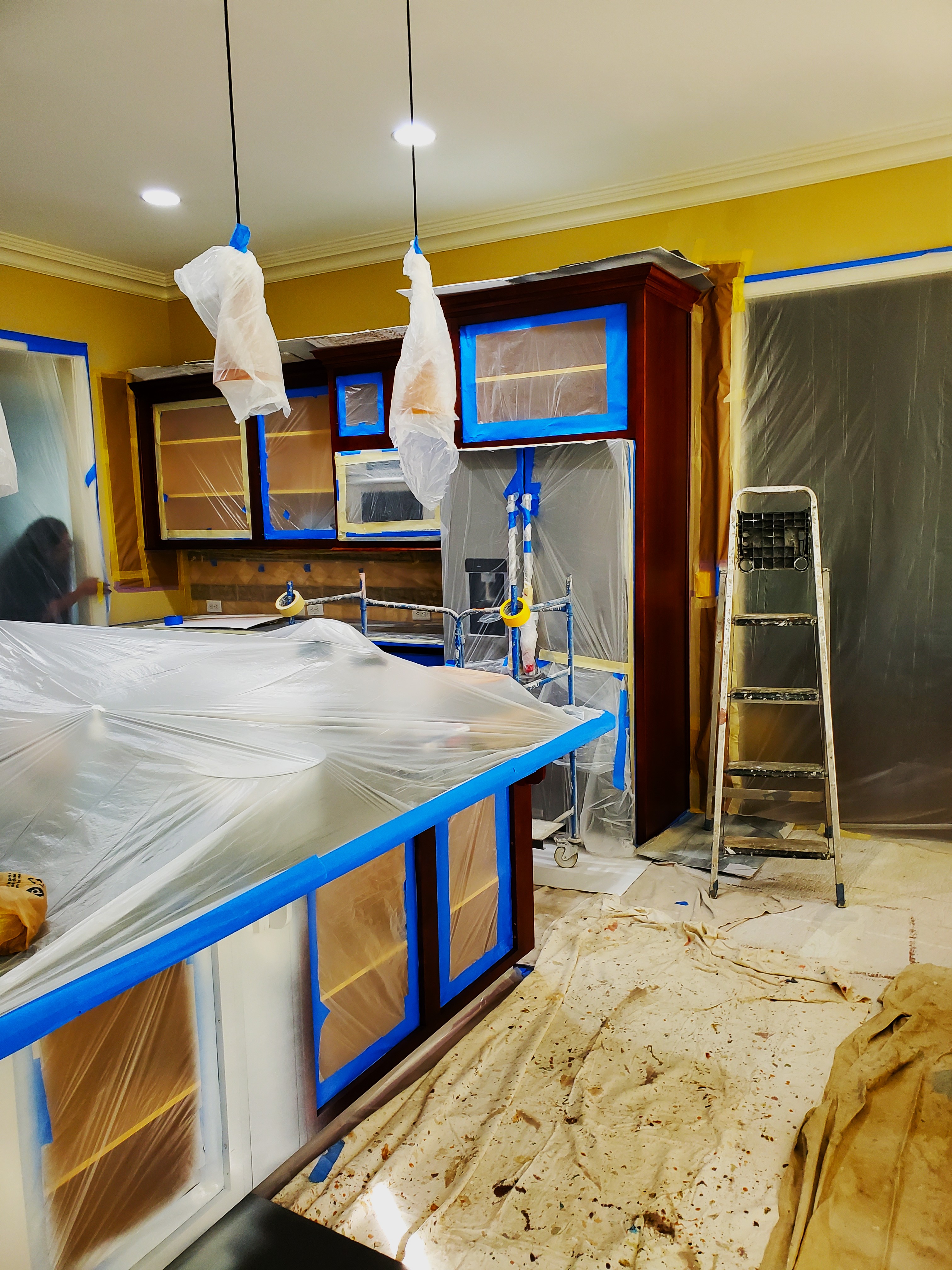 Preparation for cabinet refinishing.